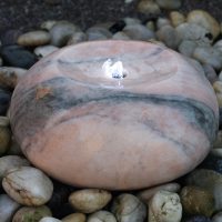 Polished sunset  and Onyx marble fountain