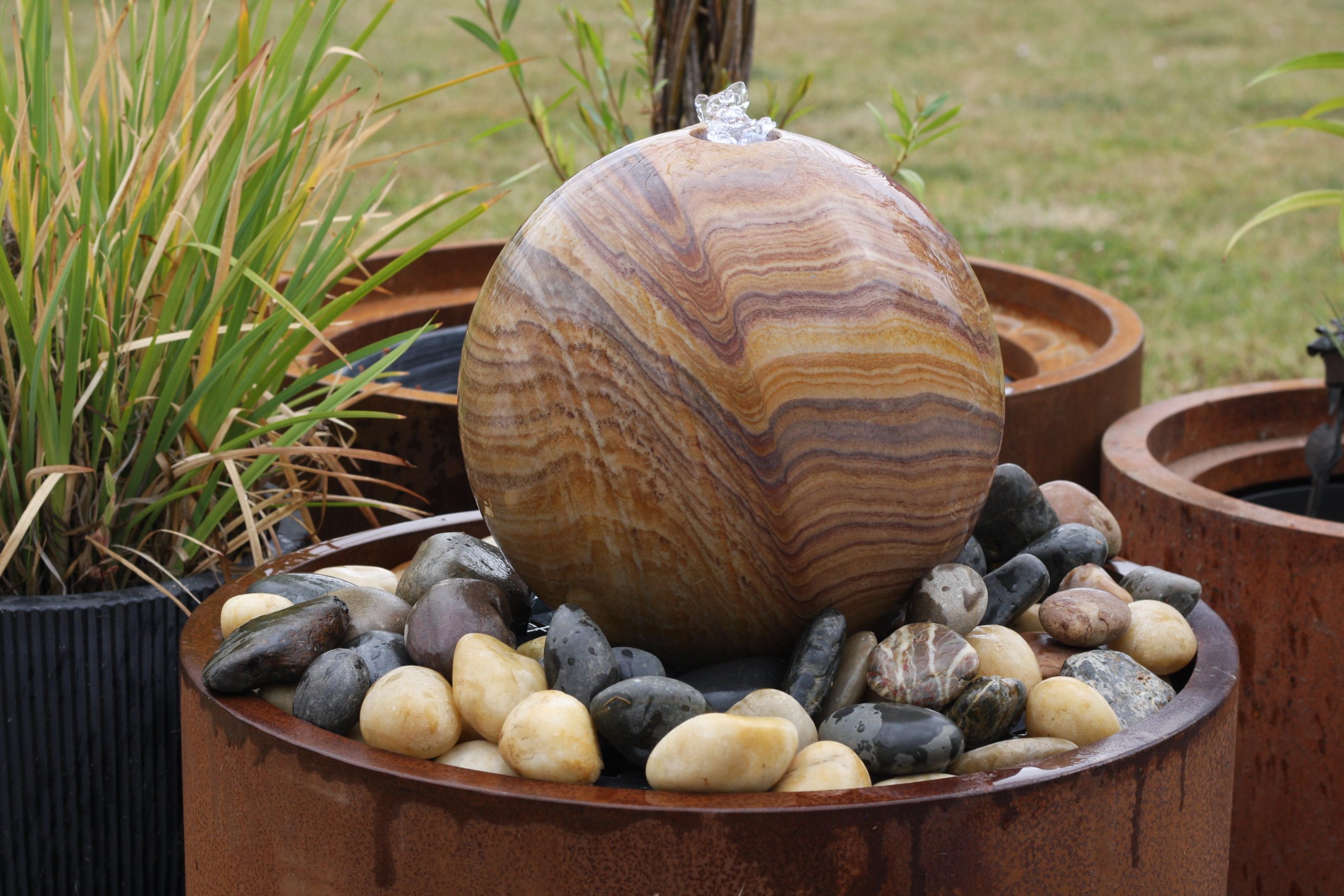 COMPLETE WATER FEATURE  - Sandstone Sphere dia30cm, dia61cm Corten surround+6008-55RES./GRID+6008ECO-S pump and light kit